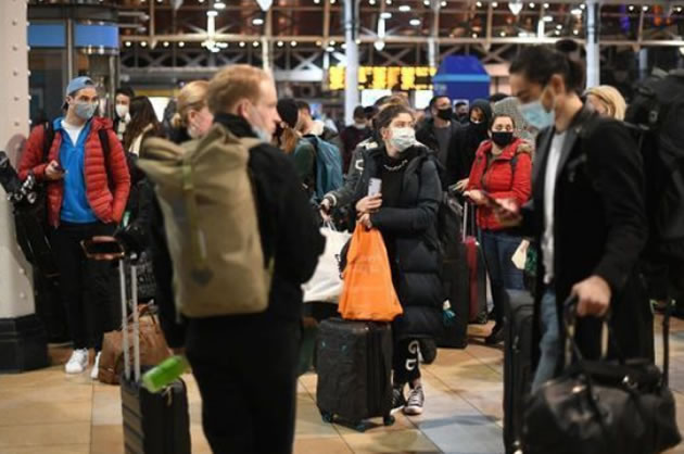 Crowded train station during pandemic