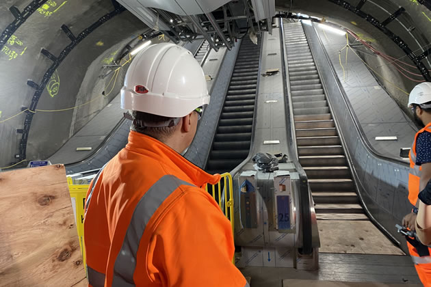 Engineers working on new escalators 