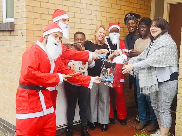 Santas Deliver Presents To Wandsworth Respite Centre 