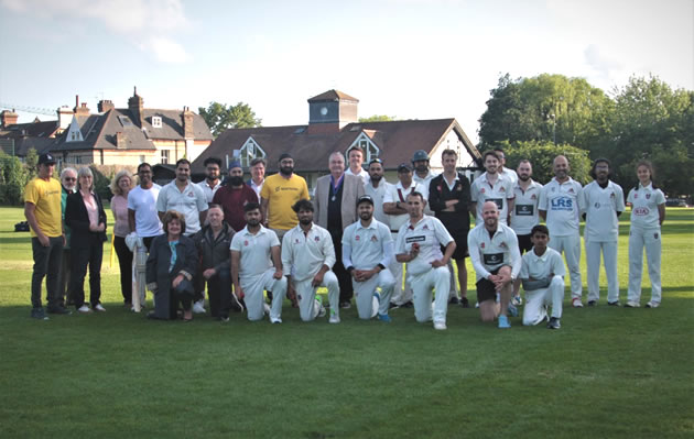 Monty with the players of SinjunGrammarians Cricket Club