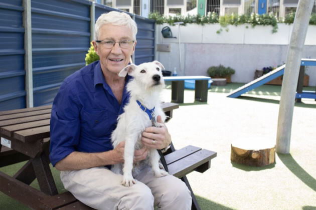 Paul and one of the dogs being cared for at Battersea 